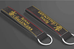 RCB key tags inspired by Royal Challengers Bangalore – red and gold IPL cricket keychains by Namu Customs.