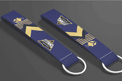 Gujarat Titans IPL key tags – navy blue and gold cricket fan keychains by Namu Customs.