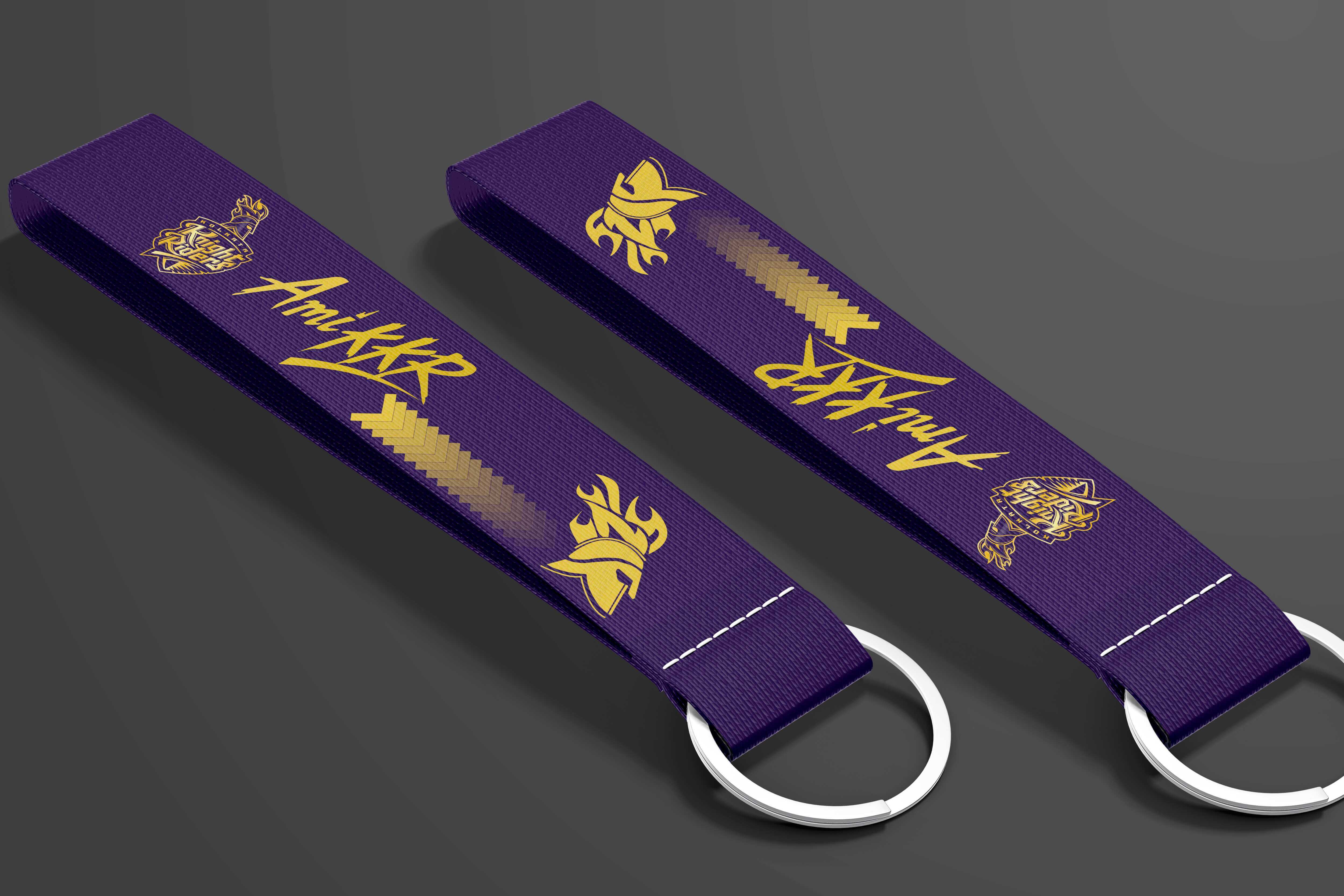 Kolkata Knight Riders IPL custom key tags featuring purple and gold design, showcasing team pride and spirit.